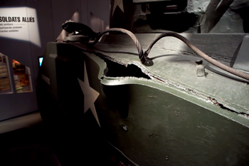 Photograph of holed American tank at Bastogne War Museum.
